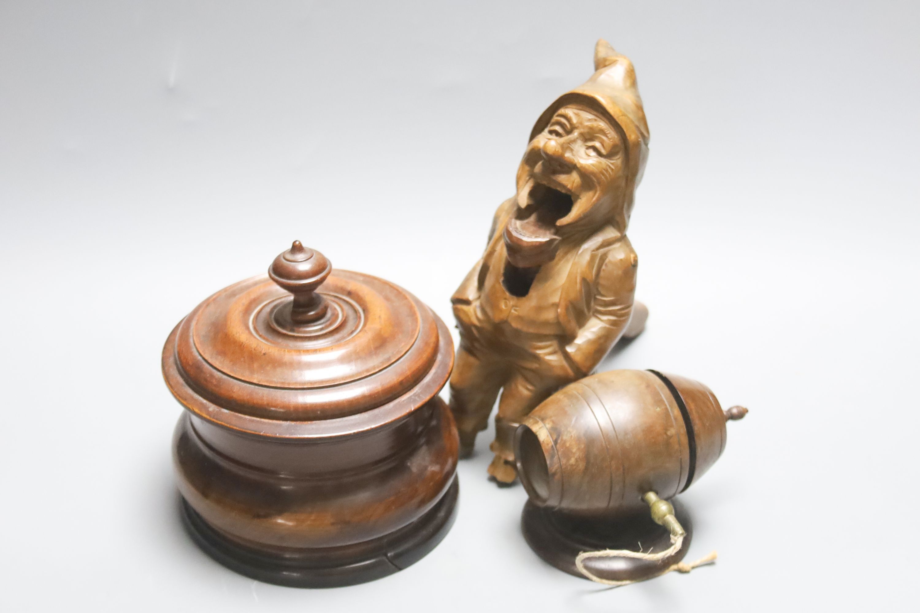 A Lignum Vitae barrel-shaped string holder on circular base, a Dutch turned wood tobacco jar and cover and sundry items